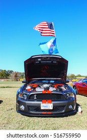 GLOUCESTER, VIRGINIA - NOVEMBER 12, 2016: A Mustang Cobra In The Annual Shop With A Cop Car Show Held Once Each Year To Help Benefit Needy Children Of Gloucester For Christmas. 
