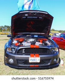 GLOUCESTER, VIRGINIA - NOVEMBER 12, 2016: A Mustang Cobra In The Annual Shop With A Cop Car Show Held Once Each Year To Help Benefit Needy Children Of Gloucester For Christmas. 
