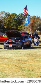 GLOUCESTER, VIRGINIA - NOVEMBER 12, 2016: A Ford Mustang Cobra In The Annual Shop With A Cop Car Show Held Once Each Year To Help Benefit Needy Children Of Gloucester For Christmas