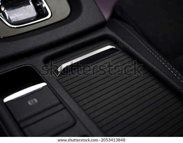 glove box,\
compartments for storing keys, glasses, car glove boxes. stylish\
car interior dark with\
chrome