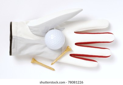 Glove, Golf Ball And Tees Isolated On White