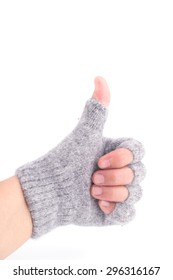 Glove isolated on white showing the thumbs up sign