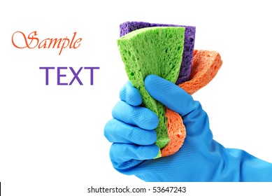 Gloved hand with colorful sponges on white background with copy space. - Powered by Shutterstock