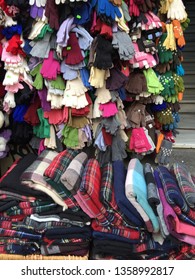 Gloves And Scarfs On Street Counter