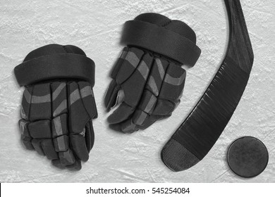 Gloves, Stick And Puck On The Ice Hockey Rink. Concept, Hockey