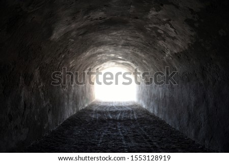 glow in end dark tunnel in selective focus
