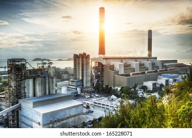 Glow light of petrochemical industry on sunset. - Shutterstock ID 165228071