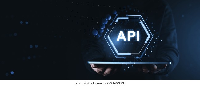 Glowing API interface concept with futuristic digital elements, person holding tablet, modern blue tech background, symbolizing data connection system