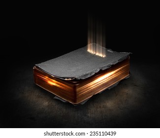 Glowing Bible With Light Coming From The Pages.