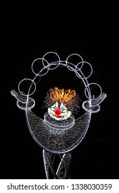 Glowing Clown Illusionist With A Red Nose Pleases The Townspeople On A Holiday At The Circus