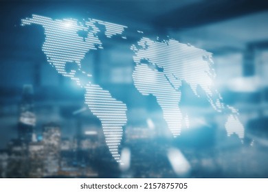 Glowing digital map hologram on blurry blue city wallpaper. Worldwide technology and network concept. Double exposure