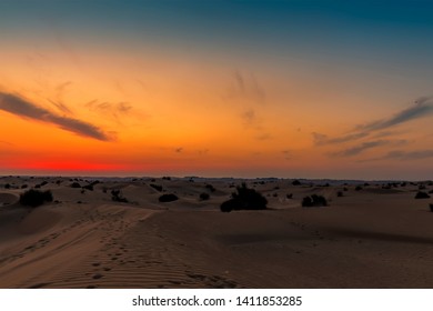 The Glowing Embers Of The Night Sky After Sunset In The Desert Outside Dubai, UAE In Springtime