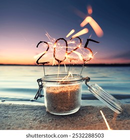 Glowing glass on the beach in the sunset with burning sparklers in the shape of the new year 2025                                - Powered by Shutterstock