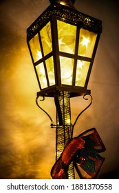 Glowing Gold Colored Christmas Lamp Post