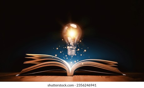 Glowing lightbulb over a book, Inspiring from read concept, Education knowledge and business education ideas, Innovations, self-learning, knowledge and searching for new ideas. Thinking for new idea. - Shutterstock ID 2356246941
