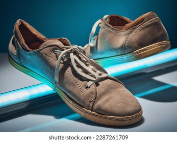 Glowing lightstick elevates brown sneakers.