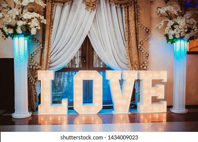 Glowing Love Text. 3d Letters Wedding Dance Floor Decoration. Light Bulb Shiny Banner.