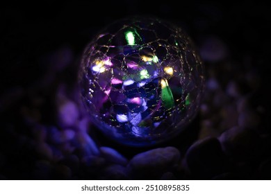 Glowing orb nested inside rock garden