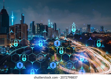 Glowing padlock hologram, night panoramic city view of Kuala Lumpur, Malaysia, Asia. The concept of cyber security shields to protect KL companies. Double exposure. - Powered by Shutterstock