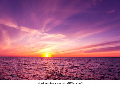 Glowing Paradise Sunset over Water  - Shutterstock ID 790677361