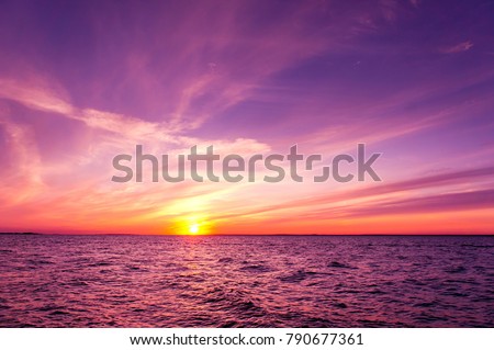 Glowing Paradise Sunset over Water 