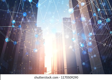 Glowing polygonal network hologram over a modern city background on a sunny day. Concept of globalization and interconnection. Toned image double exposure