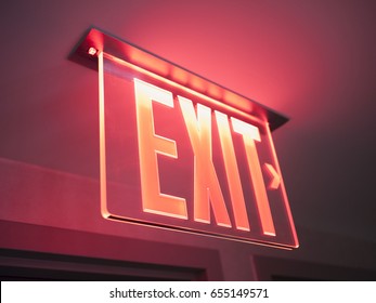 Glowing Red Exit Sign.