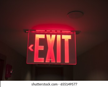 Glowing Red Exit Sign.