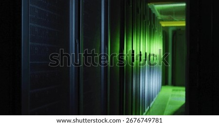 Glowing row of server racks lining data center corridor, with green LED lights and cable trays. Technology, data, infrastructure, cybersecurity, industrial, digital, networking