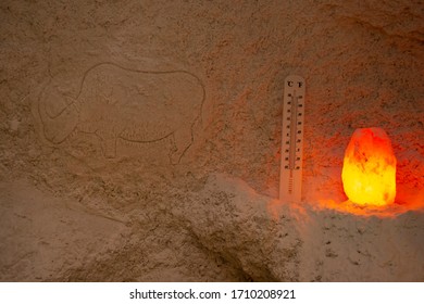 A Glowing Salt Lamp Standing In A Salt Cave