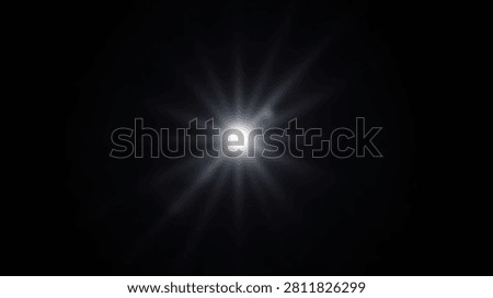 A glowing white light source creates a sharp starburst and lens flare effect against a solid black backdrop.