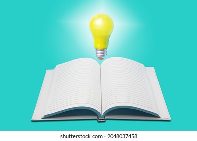 Glowing Yellow Light Bulb With Open White Notebook On Light Green Background , Innovation And Ideation Concept