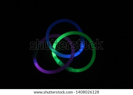 Glowsticks arranged in a circular pattern