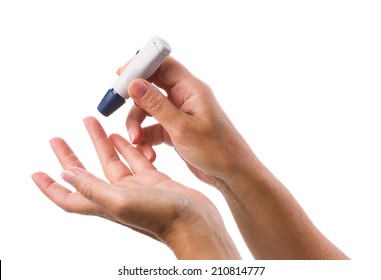 Glucometer in woman's hand for measuring glucose level blood test isolated on a white background