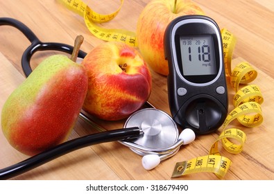 Glucose meter with medical stethoscope and fresh fruits, concept of diabetes, healthy lifestyles and nutrition - Powered by Shutterstock