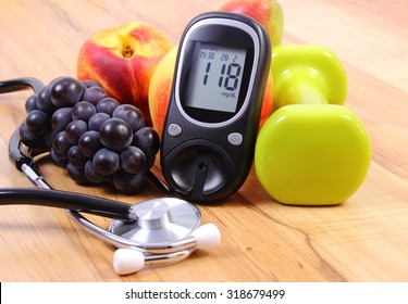 Glucose meter with medical stethoscope, fruits and dumbbells for using in fitness, concept of diabetes, healthy lifestyles and nutrition - Powered by Shutterstock