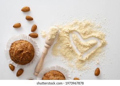 Gluten Free Baked Goods, Muffins On Almond Flour With Nuts On A White Background, Love Heart Symbol, Keto Food, Top View