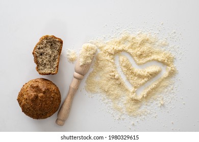 Gluten Free Baked Goods, Muffins On Almond Flour With Nuts On A White Background, Love Heart Symbol, Keto Food, Top View