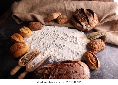 Gluten Free Breads, Glutenfree Word Written And Bread Rolls On Grey Background