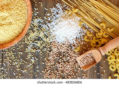 Gluten Free Cereals Corn, Rice, Buckwheat, Quinoa, Millet And Pasta On Brown Wooden Background,overhead Horizontal View