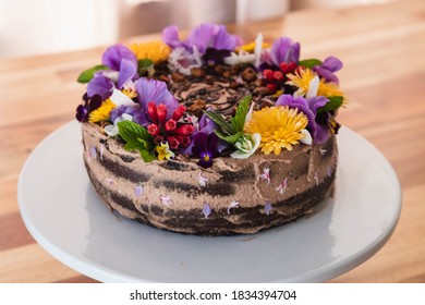 Gluten Free Chocolate Cake Decorated With Edible Flowers