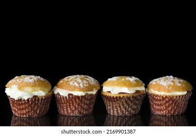 Gluten Free Muffin With Cream On Black Background