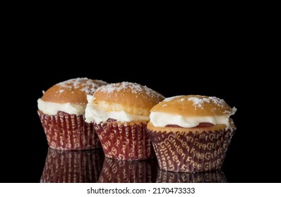 Gluten Free Muffin With Cream On Black Background