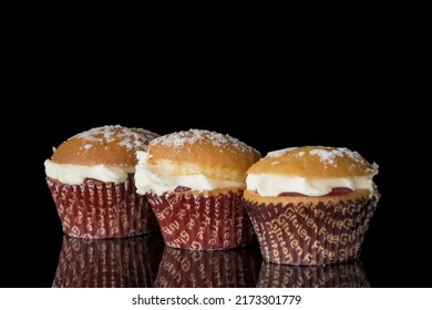 Gluten Free Muffin With Cream On Black Background