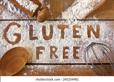 gluten free  word with wood background - Shutterstock ID 245254981