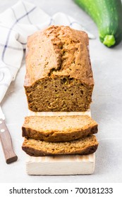 Gluten free zucchini bread slices on concrete background. Selective focus, space for text.