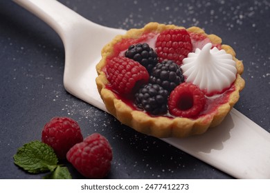 gluten-free dessert, mini tart with fresh berries - Powered by Shutterstock