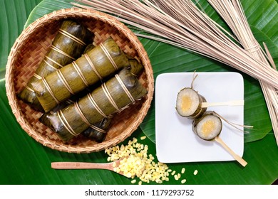 Glutinous rice steamed in bamboo bowl on banana leaf. - Shutterstock ID 1179293752
