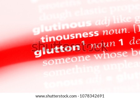 glutton word in a dictionary. glutton concept