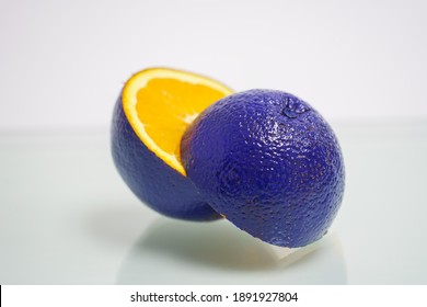 GMO Orange with blue peel. Cheating concept